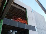 Erecting Stone panels at the 4th floor East Elevation 1.jpg